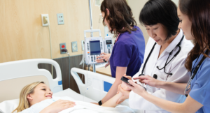 healthcare workers with patient using dect phone